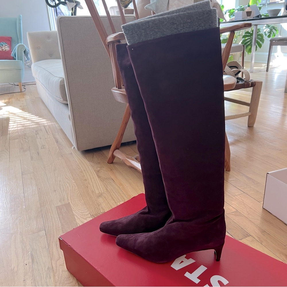 Staid knee-length suede boots